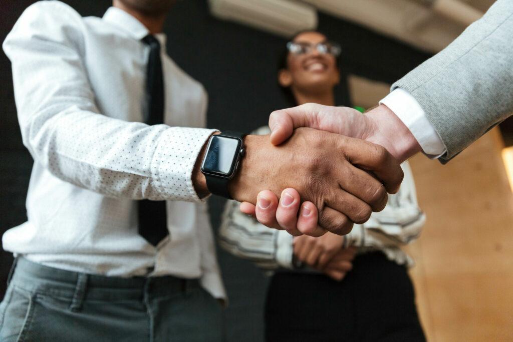 Businessmen Handshake Scaled