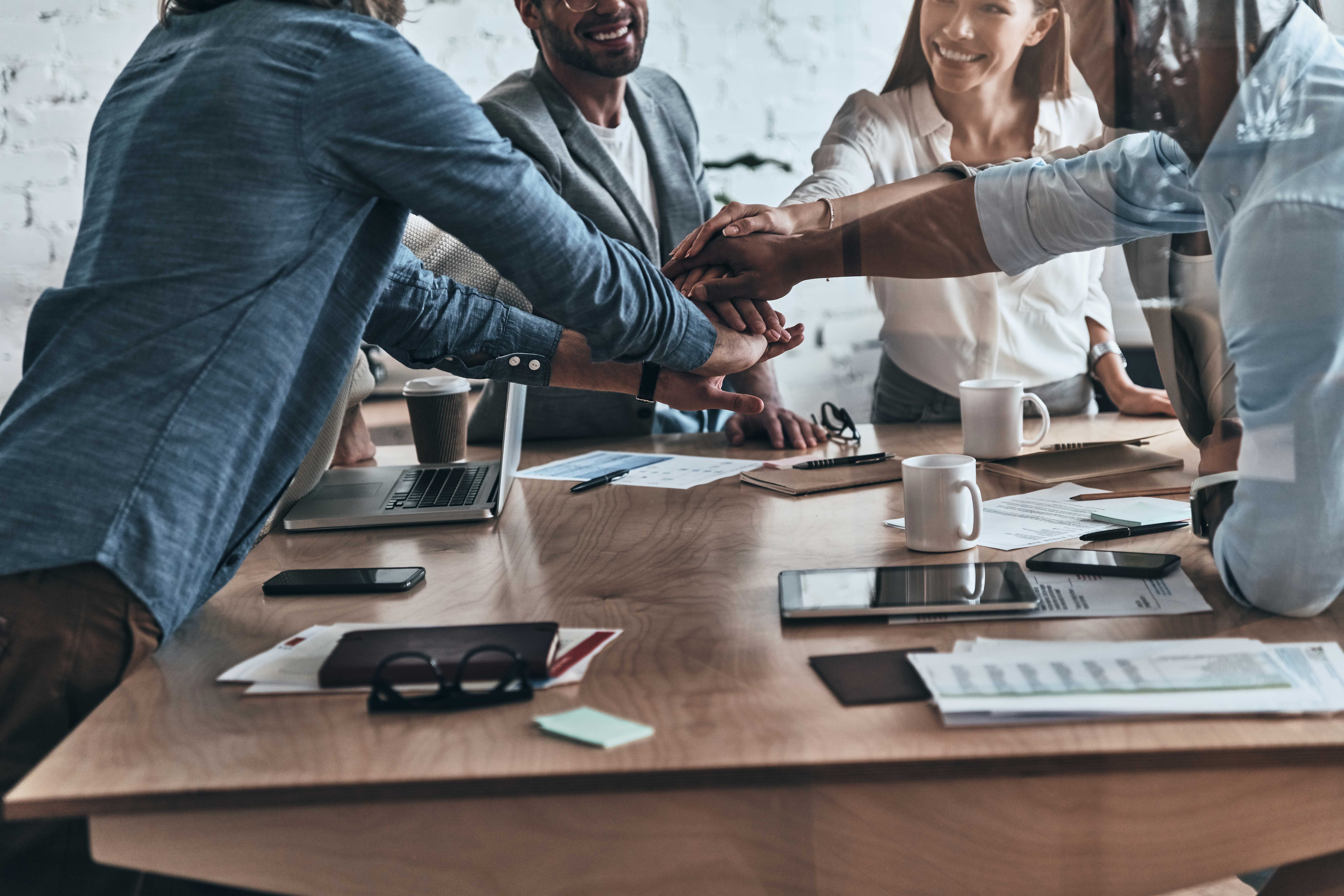 Hr Consulting 15 Successful Team Close Up Diverse Group Business Colleagues Holding Hands Top One Another Symbol Unity While Working Board Room